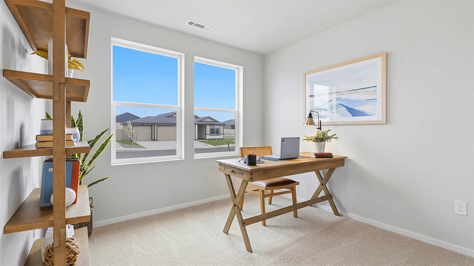 Bedroom with wall-to-wall carpet and a closet