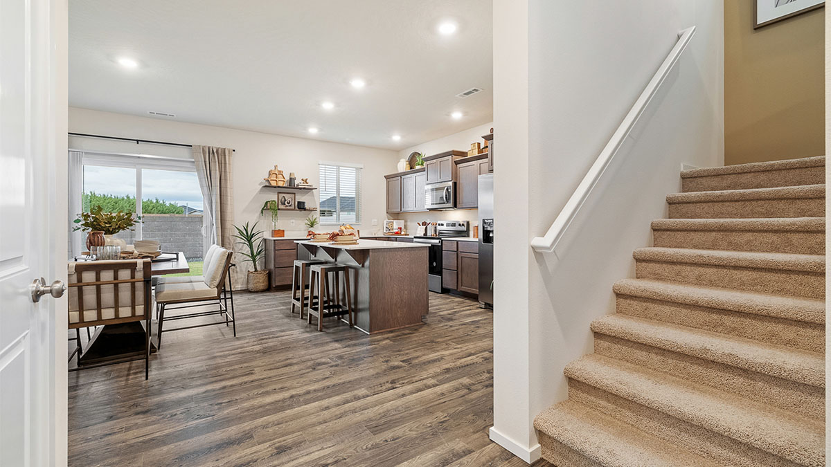 Entryway with a coat closet and laminate flooring