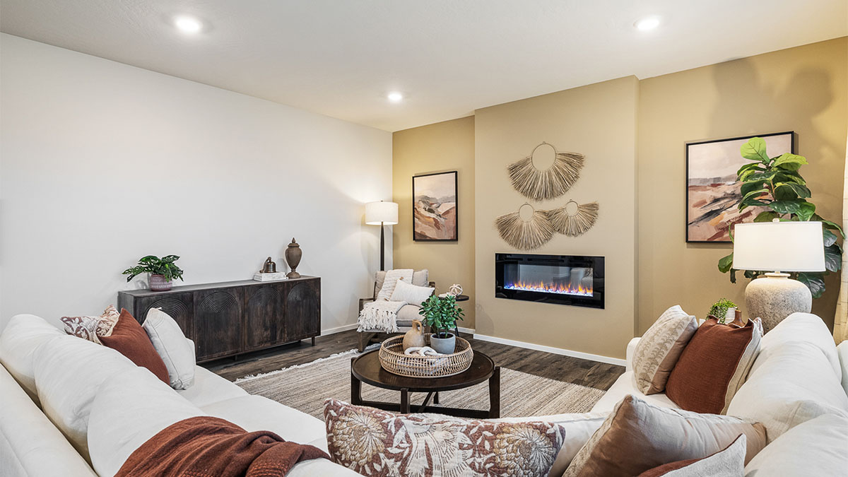 Great room with laminate flooring and an electric fireplace