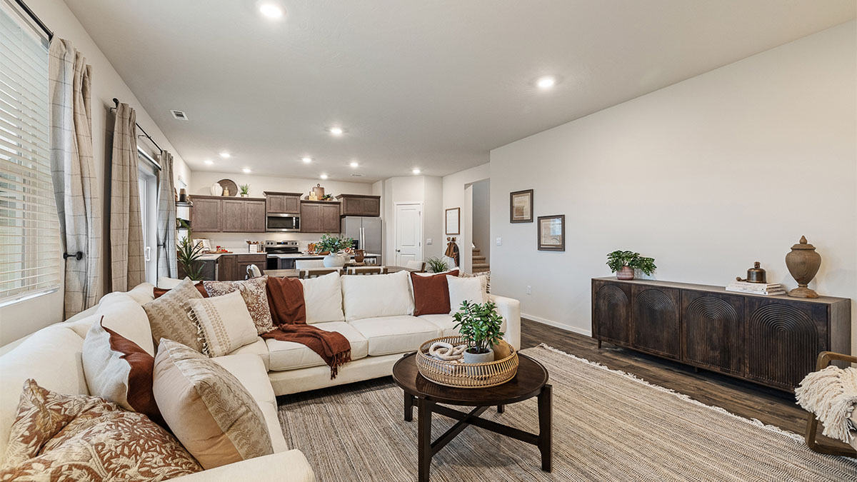 Great room with laminate flooring and an electric fireplace