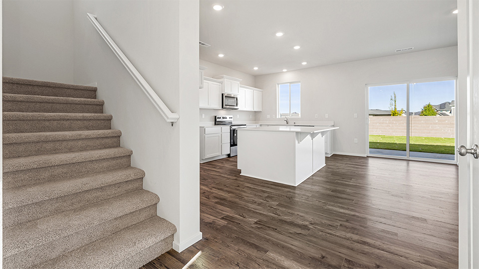 Entryway with a coat closet and laminate flooring