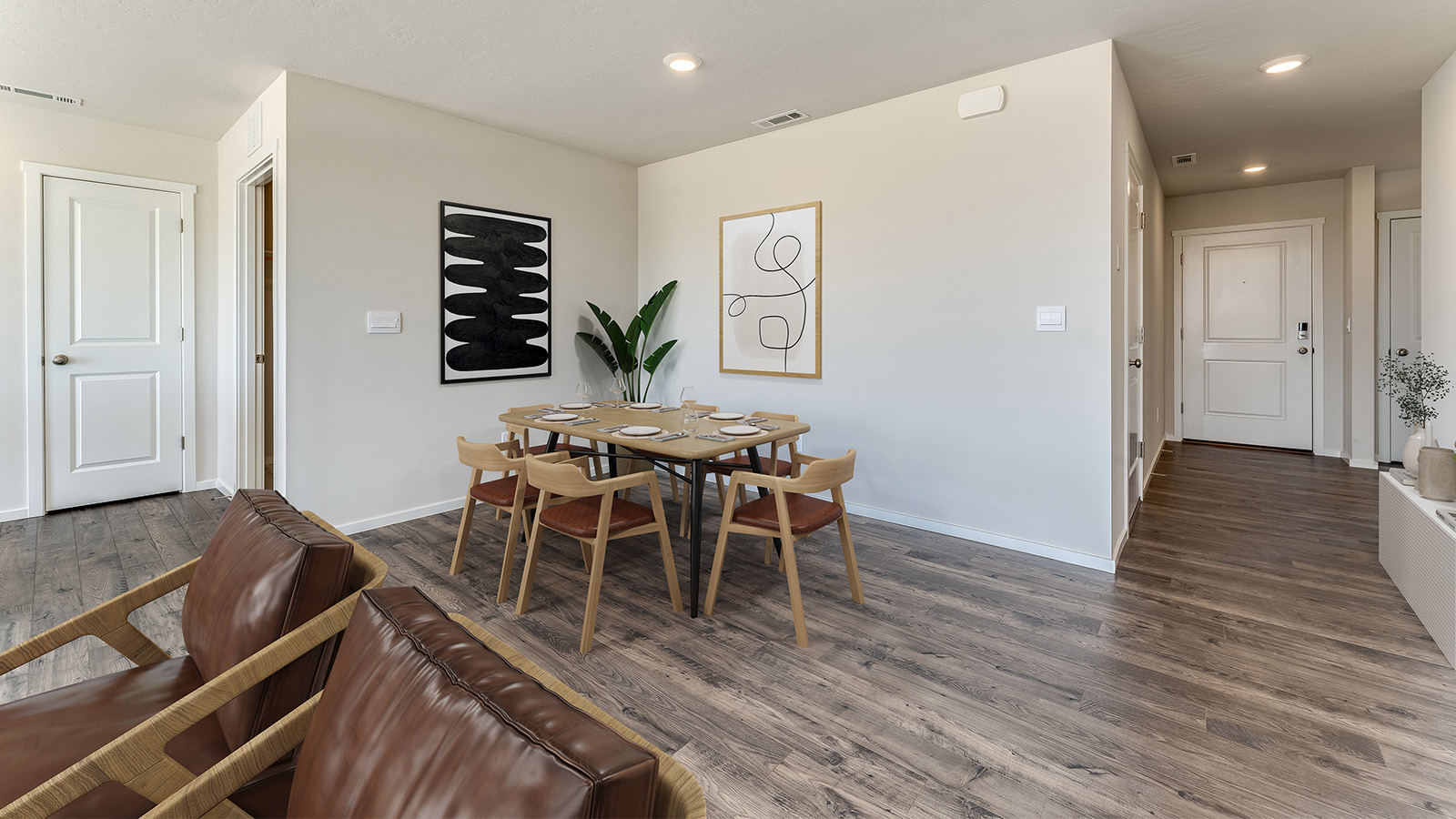 Great room with laminate flooring and an electric fireplace