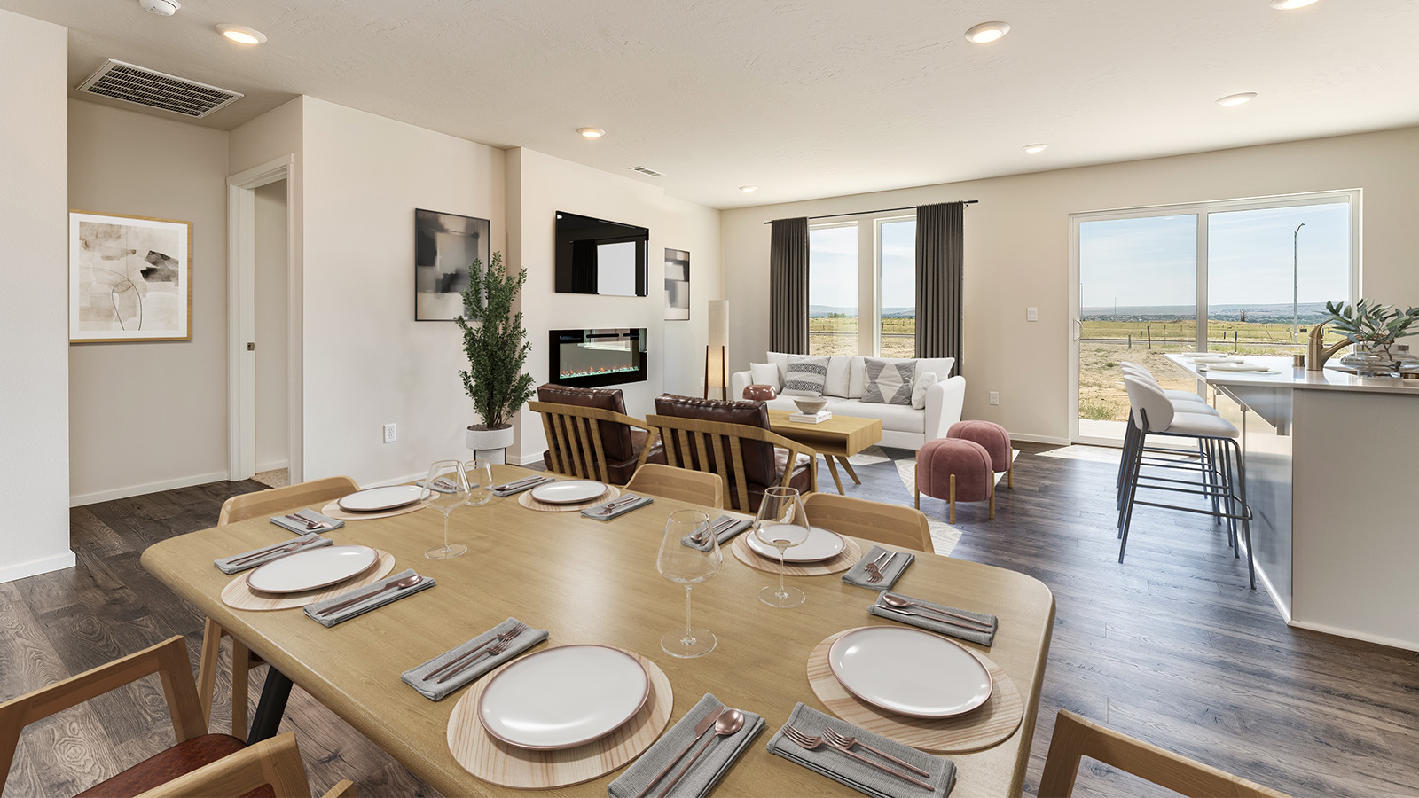 Great room with laminate flooring and an electric fireplace