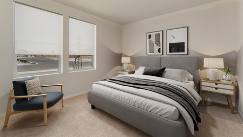 Guest bedroom with wall-to-wall carpet and a closet