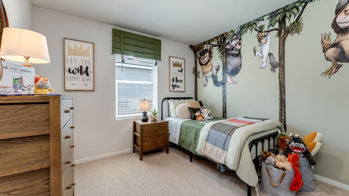 Bedroom with wall-to-wall carpet and a closet