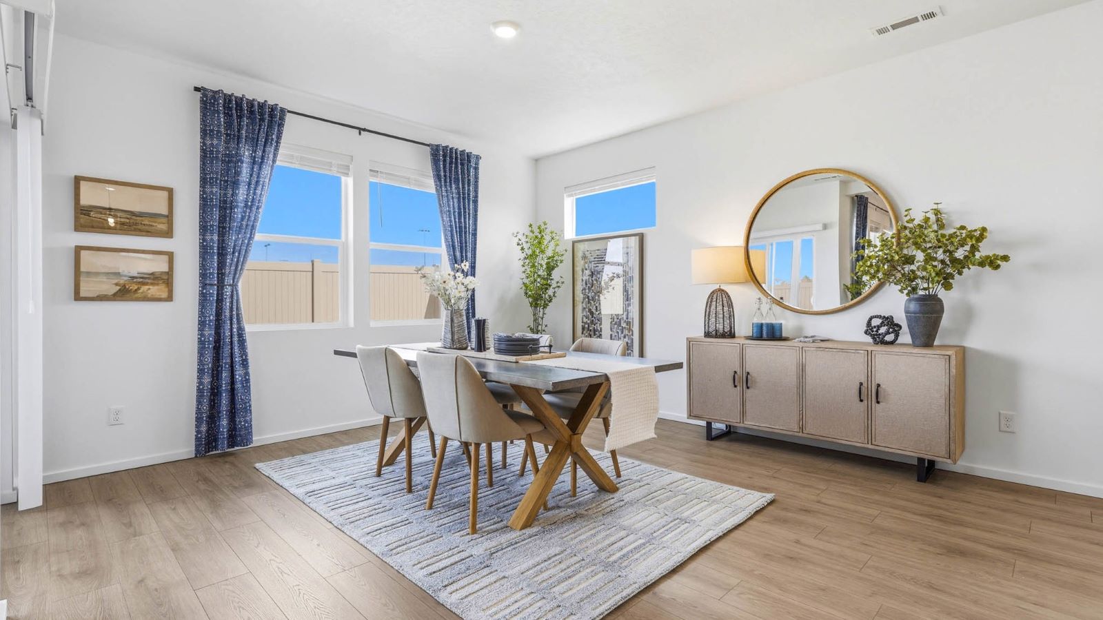 Dining area with a sliding glass door to a fenced backyard