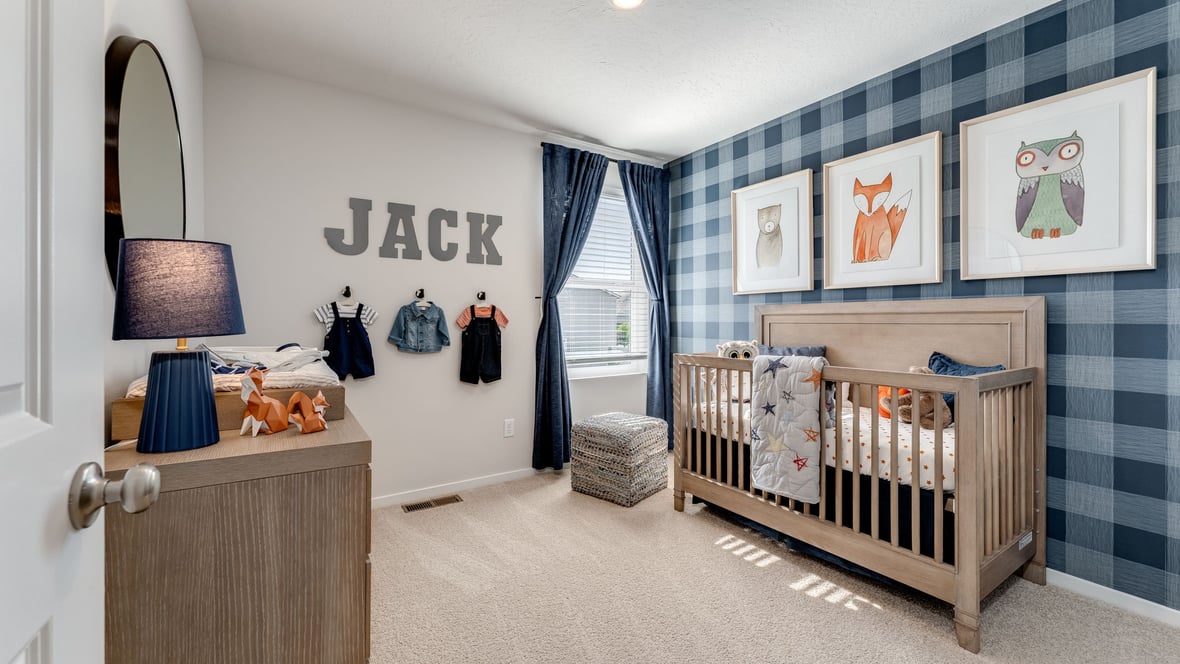Bedroom with wall-to-wall carpet and a closet
