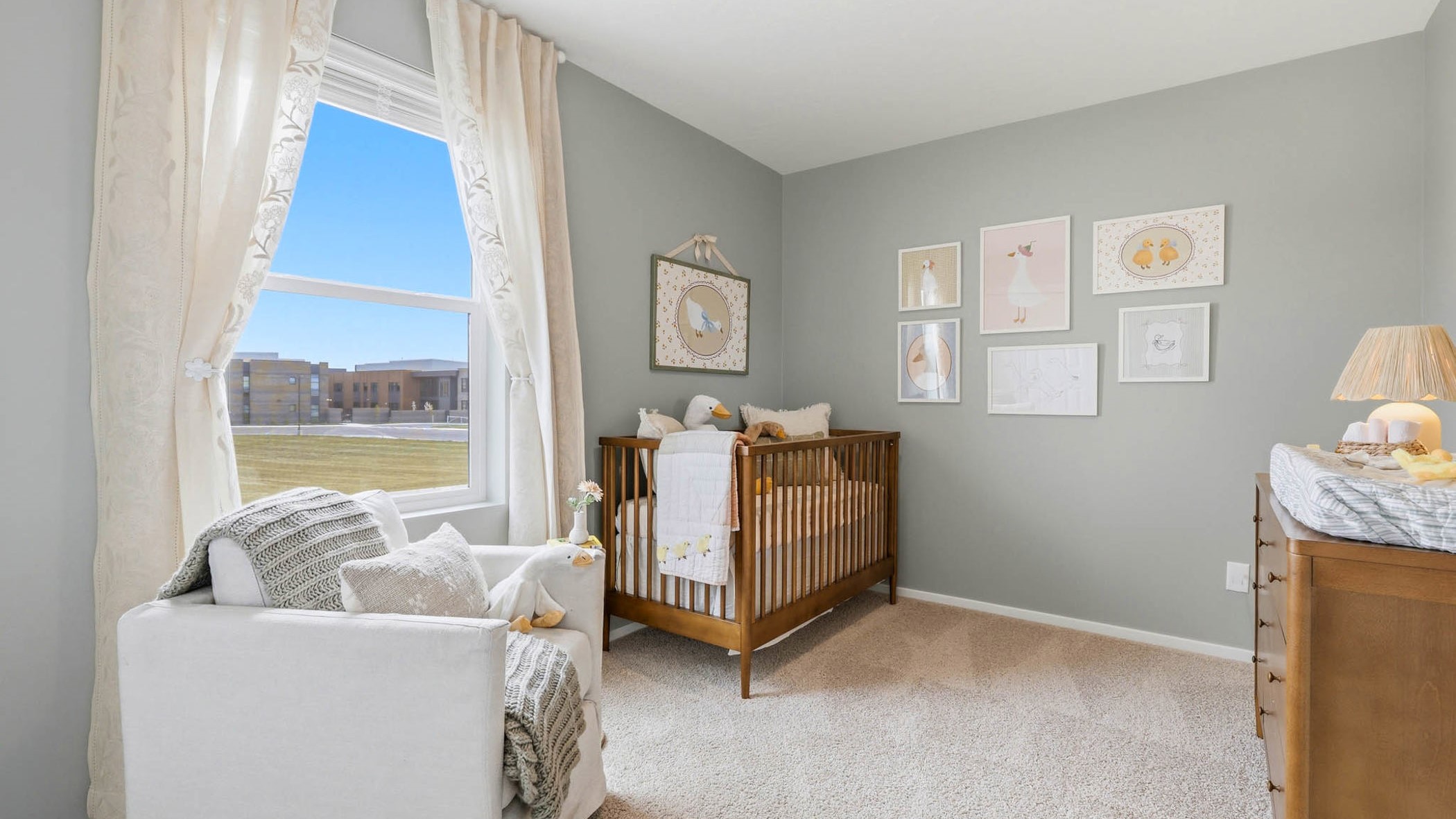 Bedroom with wall-to-wall carpet and a closet