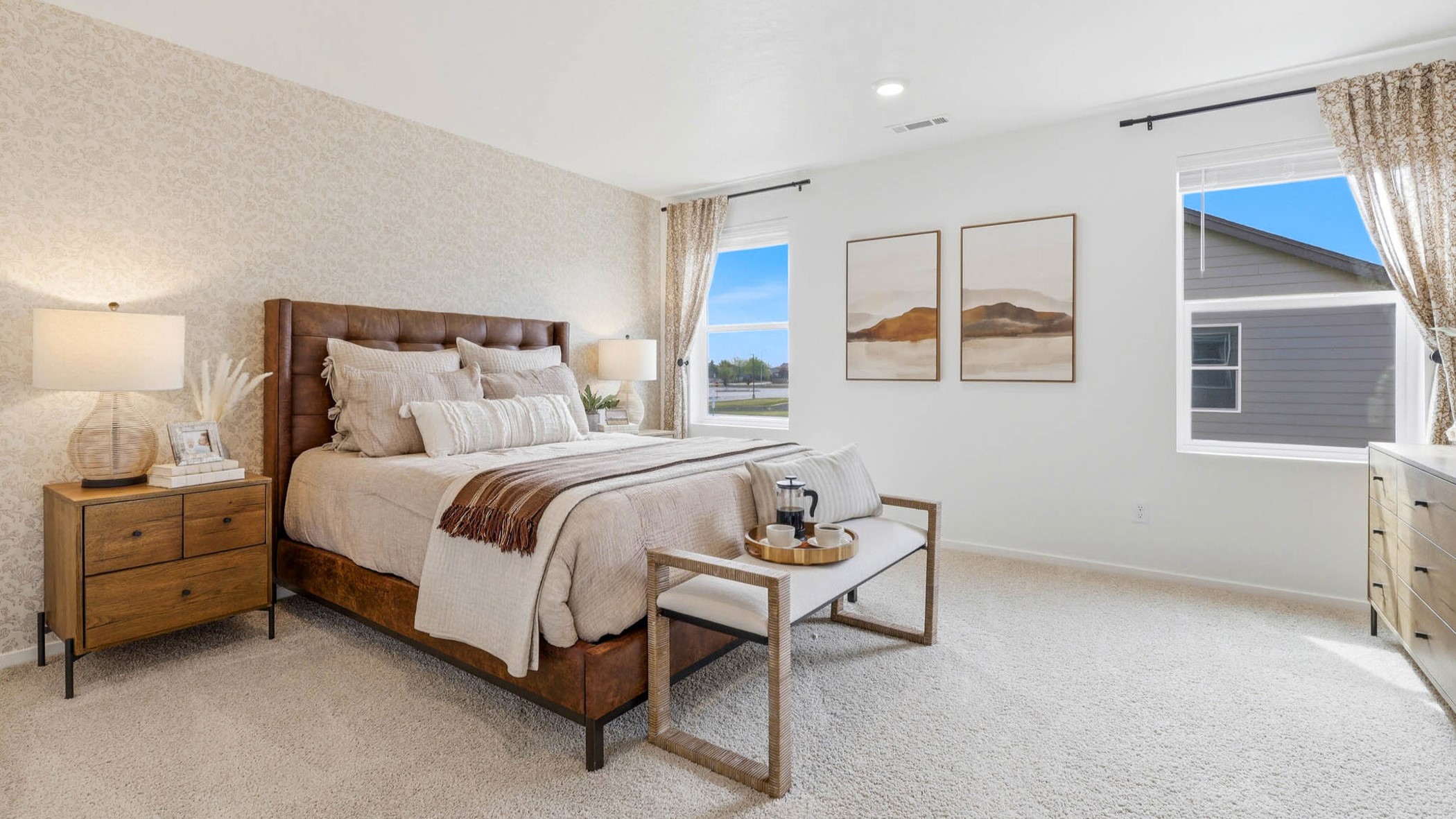 Primary bedroom with wall-to-wall carpet, a walk-in closet and an attached bathroom