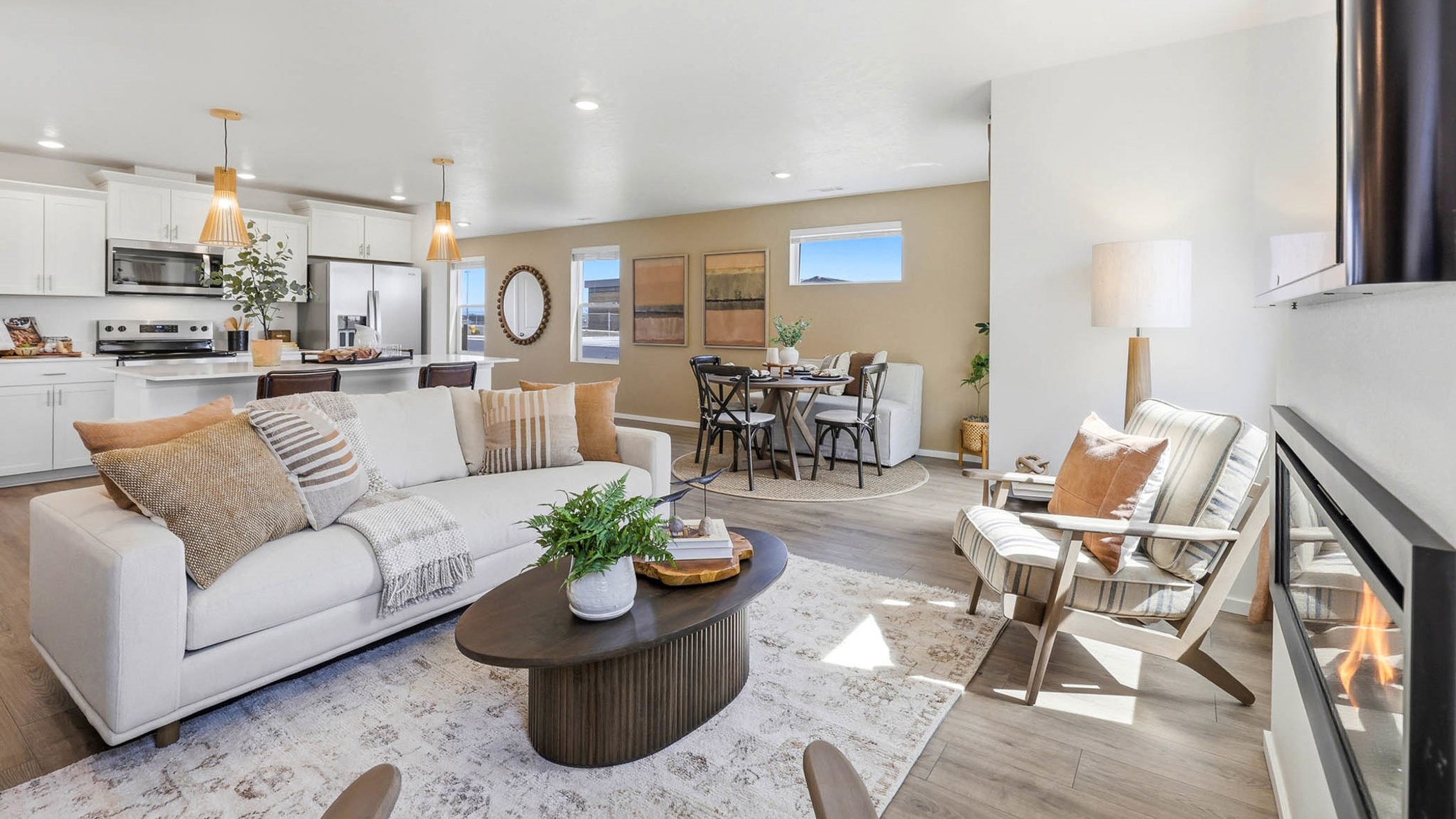 Great room with laminate flooring and an electric fireplace