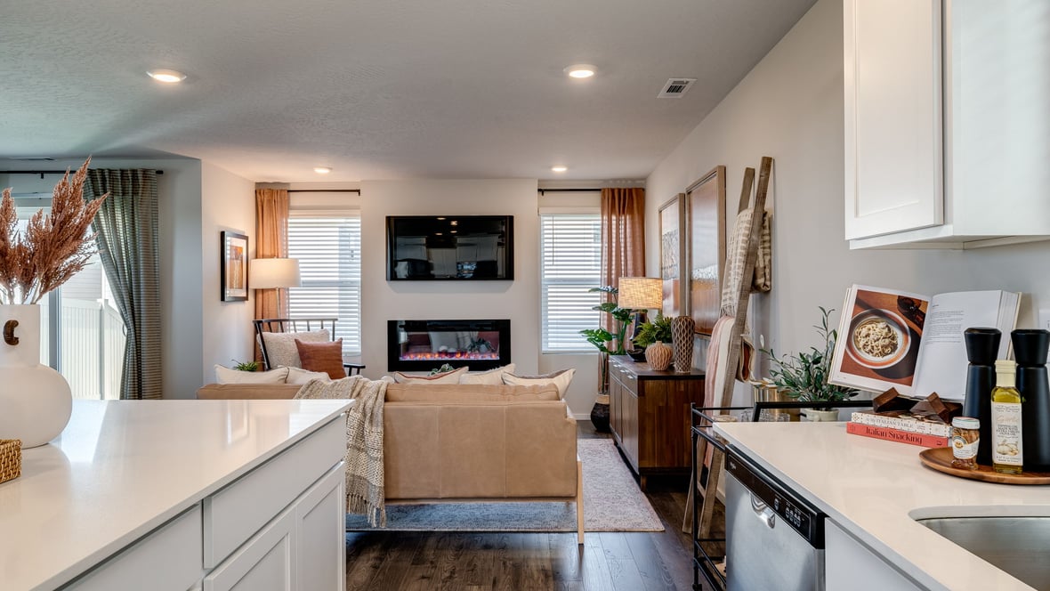 Great room with laminate flooring and an electric fireplace