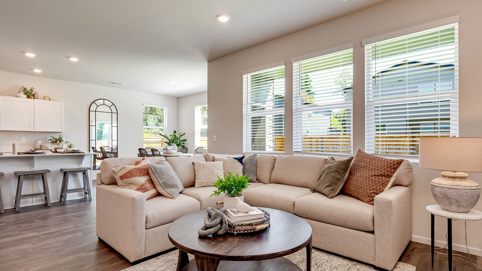 Great room with laminate flooring and an electric fireplace