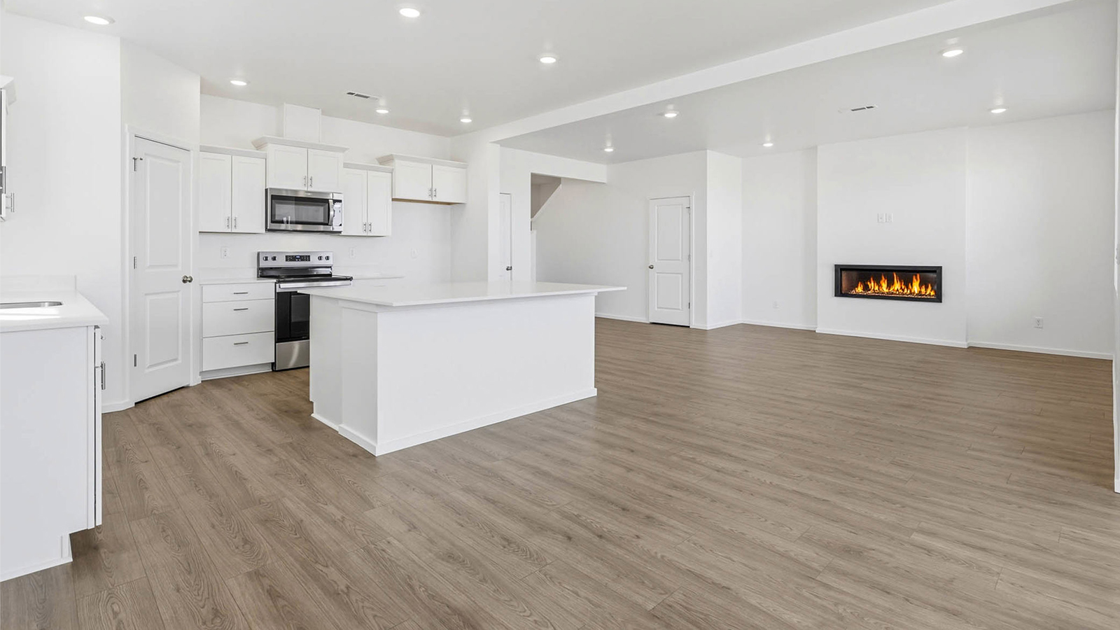 Dining area with a sliding glass door to a fenced backyard