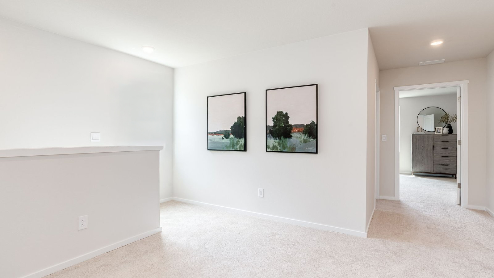 Hallway with wall-to-wall carpet