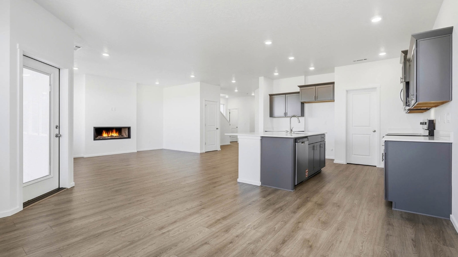 Dining area with a sliding glass door to a fenced backyard