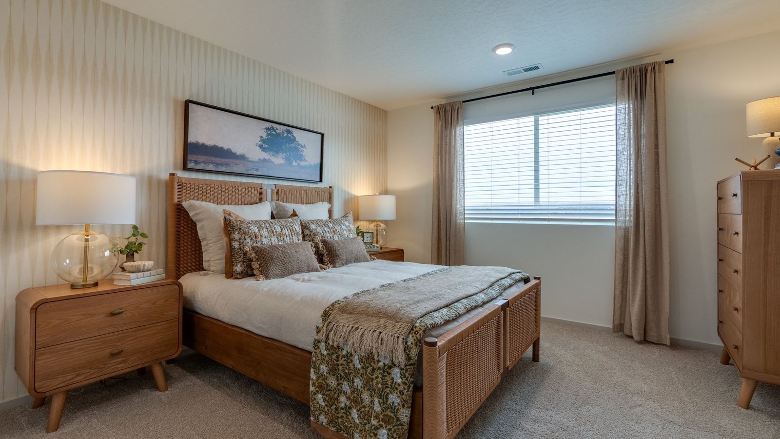 Primary bedroom with wall-to-wall carpet, a walk-in closet and an attached bathroom
