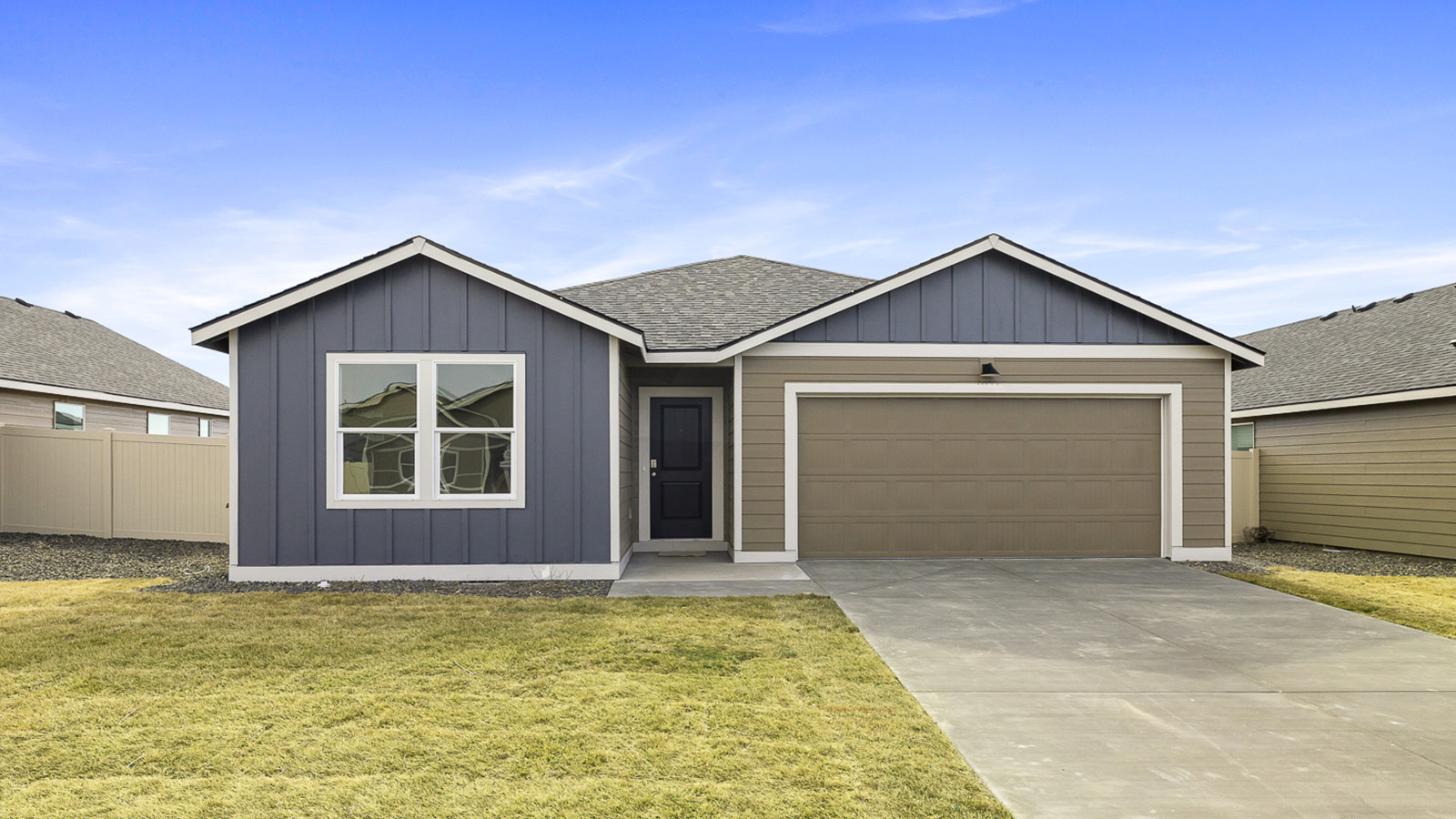 sample exterior of a Cali single story home with a 2-car garage at The Orchards at Goose Ridge Estates in Richland Washington