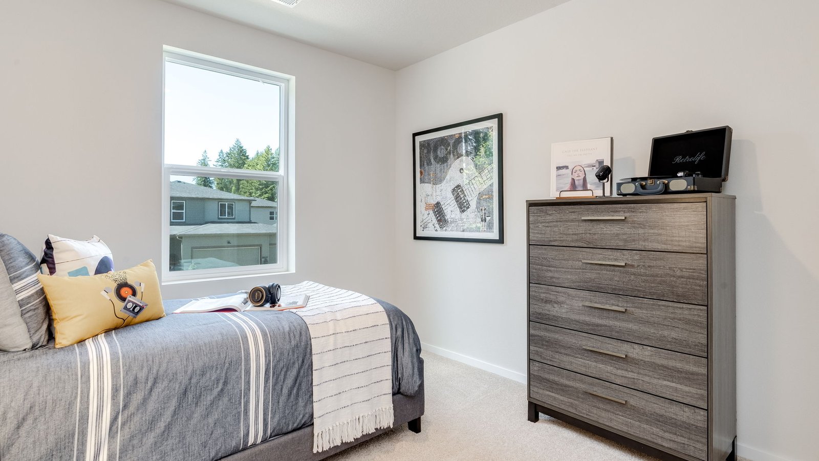 Bedroom with wall-to-wall carpet and a closet