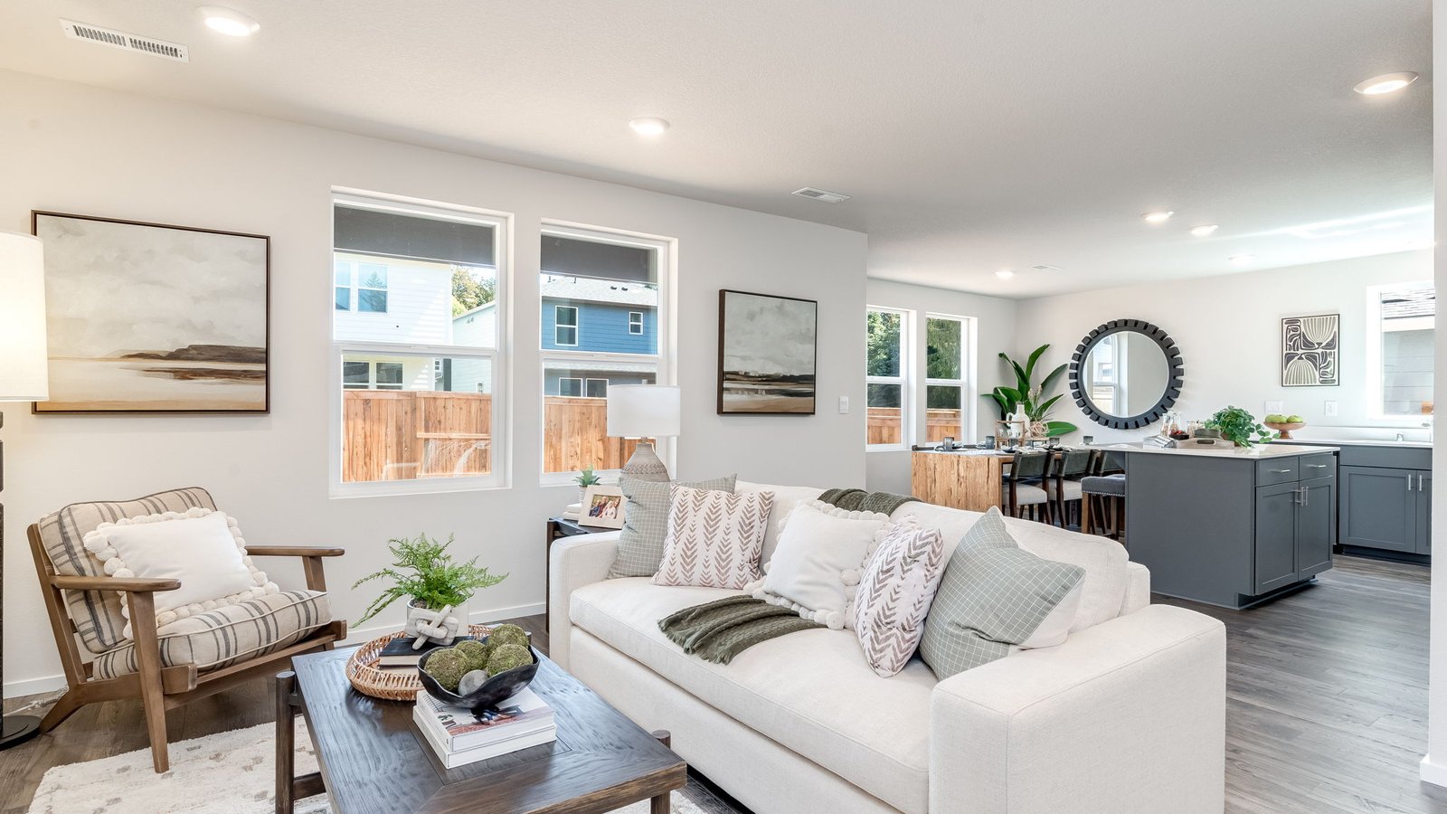 Great room with laminate flooring and an electric fireplace