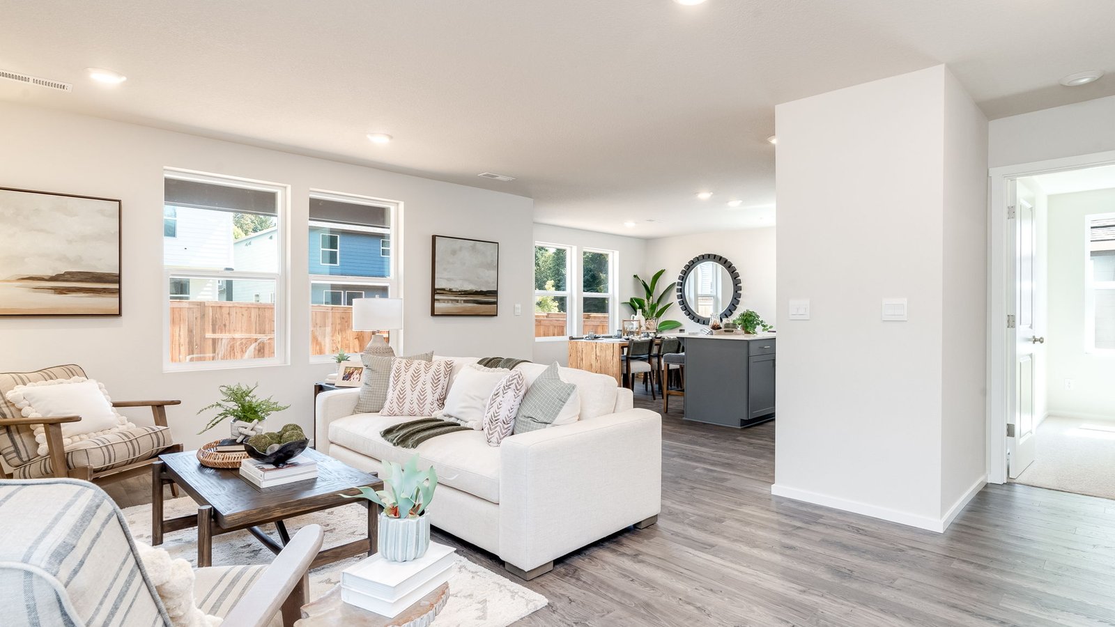 Great room with laminate flooring and an electric fireplace