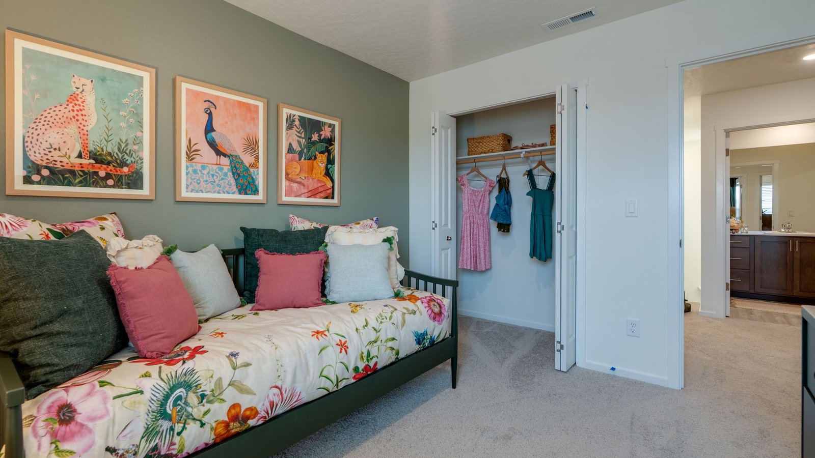 Bedroom with wall-to-wall carpet and a closet