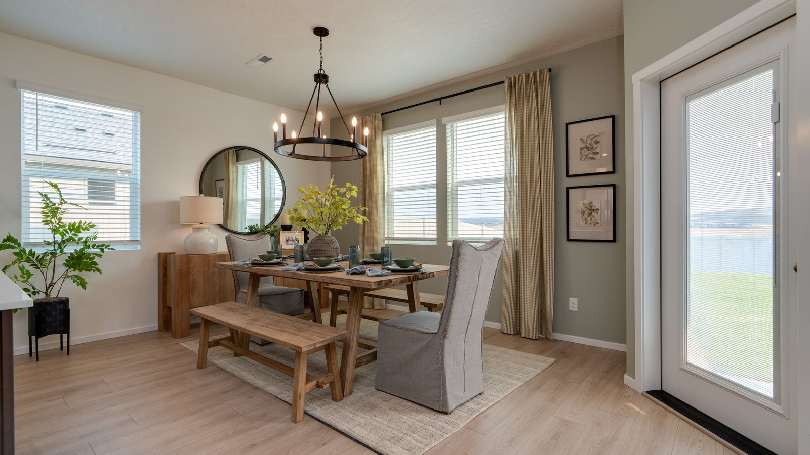 Dining area with a sliding glass door to a fenced backyard