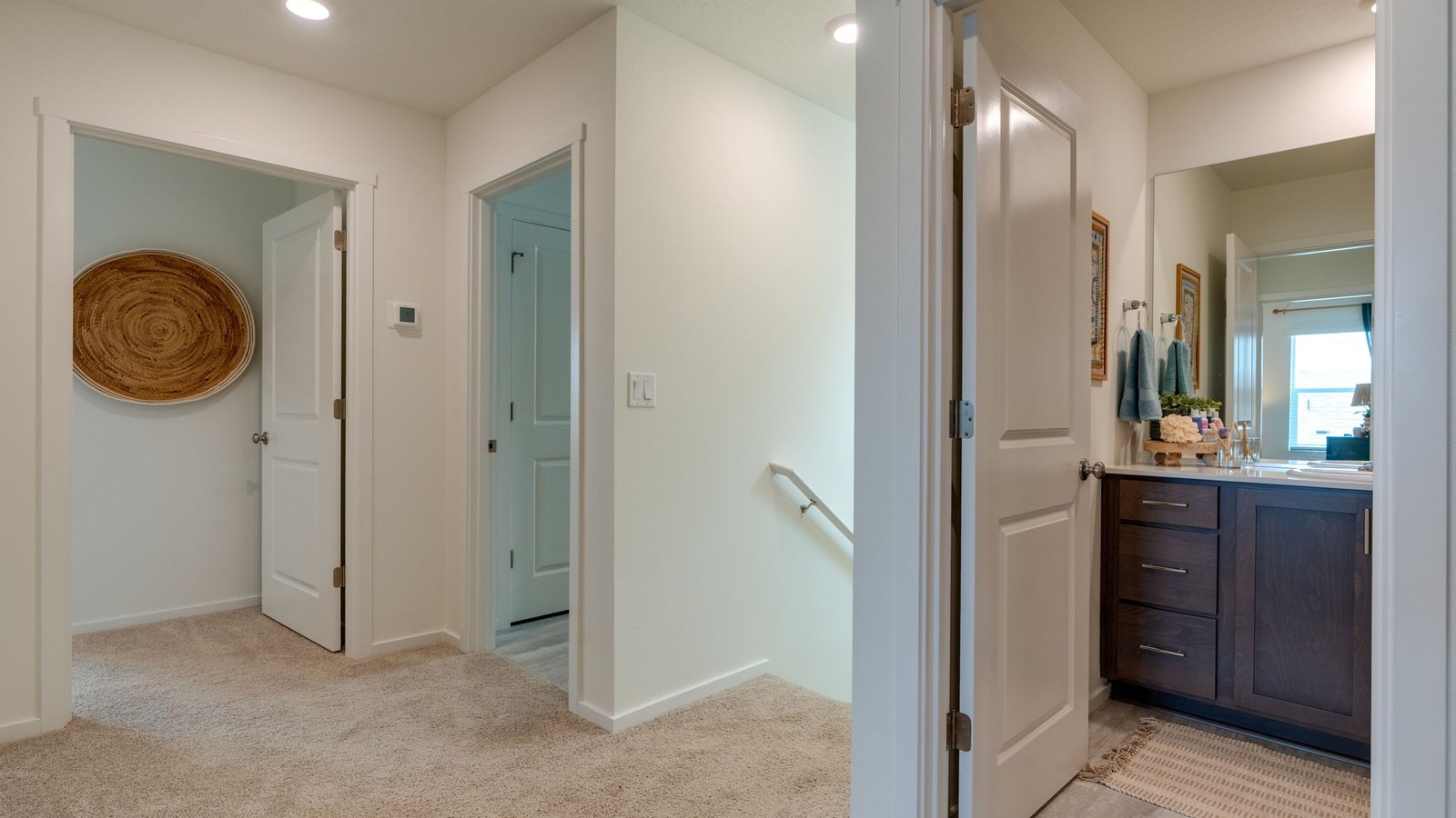 Hallway with wall-to-wall carpet