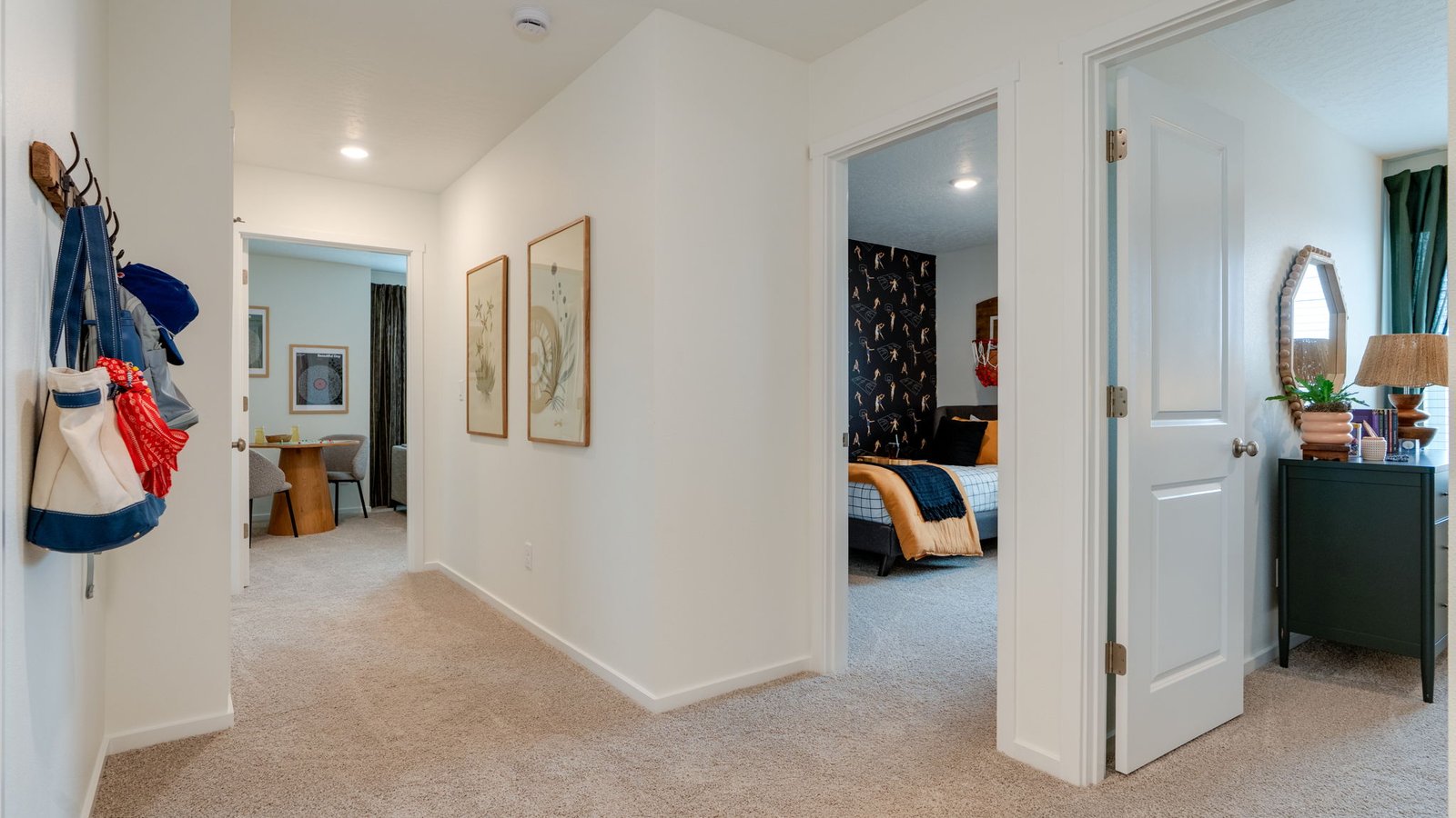 Hallway with wall-to-wall carpet