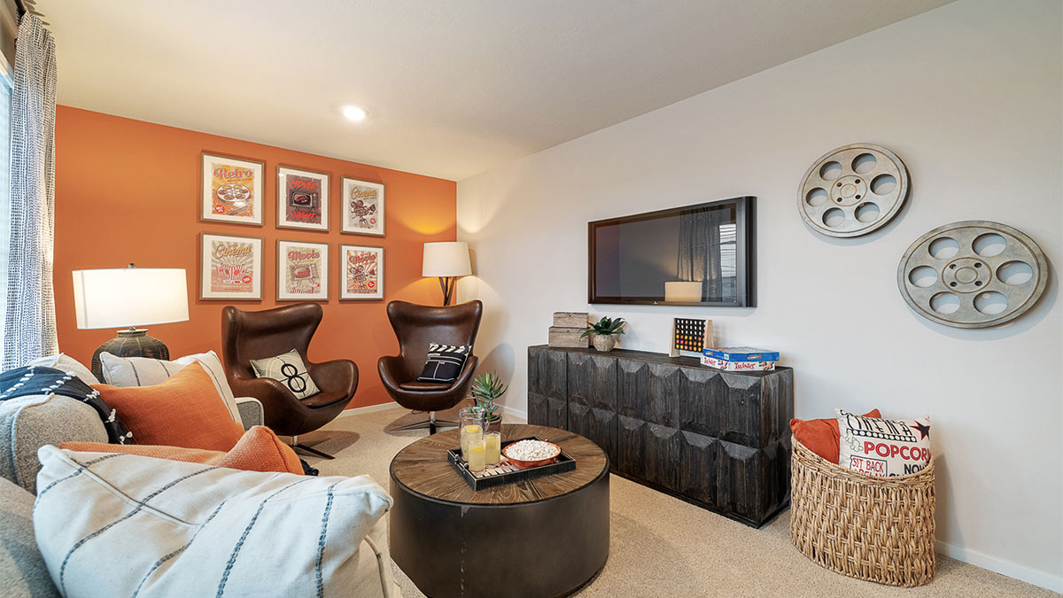 Bedroom with wall-to-wall carpet and a closet