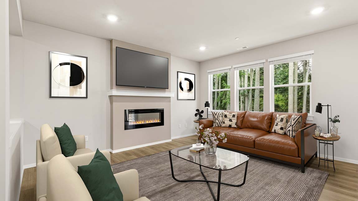 Great room with fireplace and ample natural light
