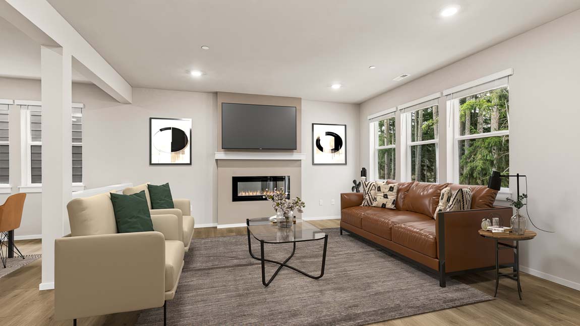 Great room with interior fireplace and 3 windows