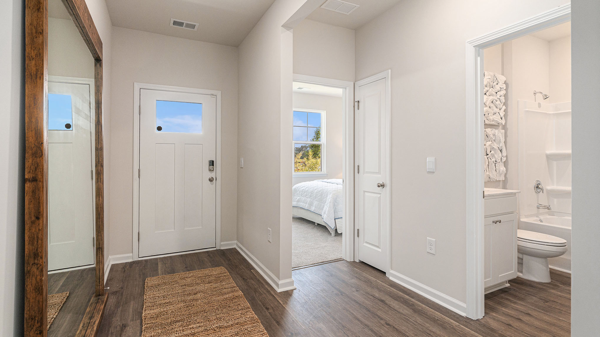 entryway with white door