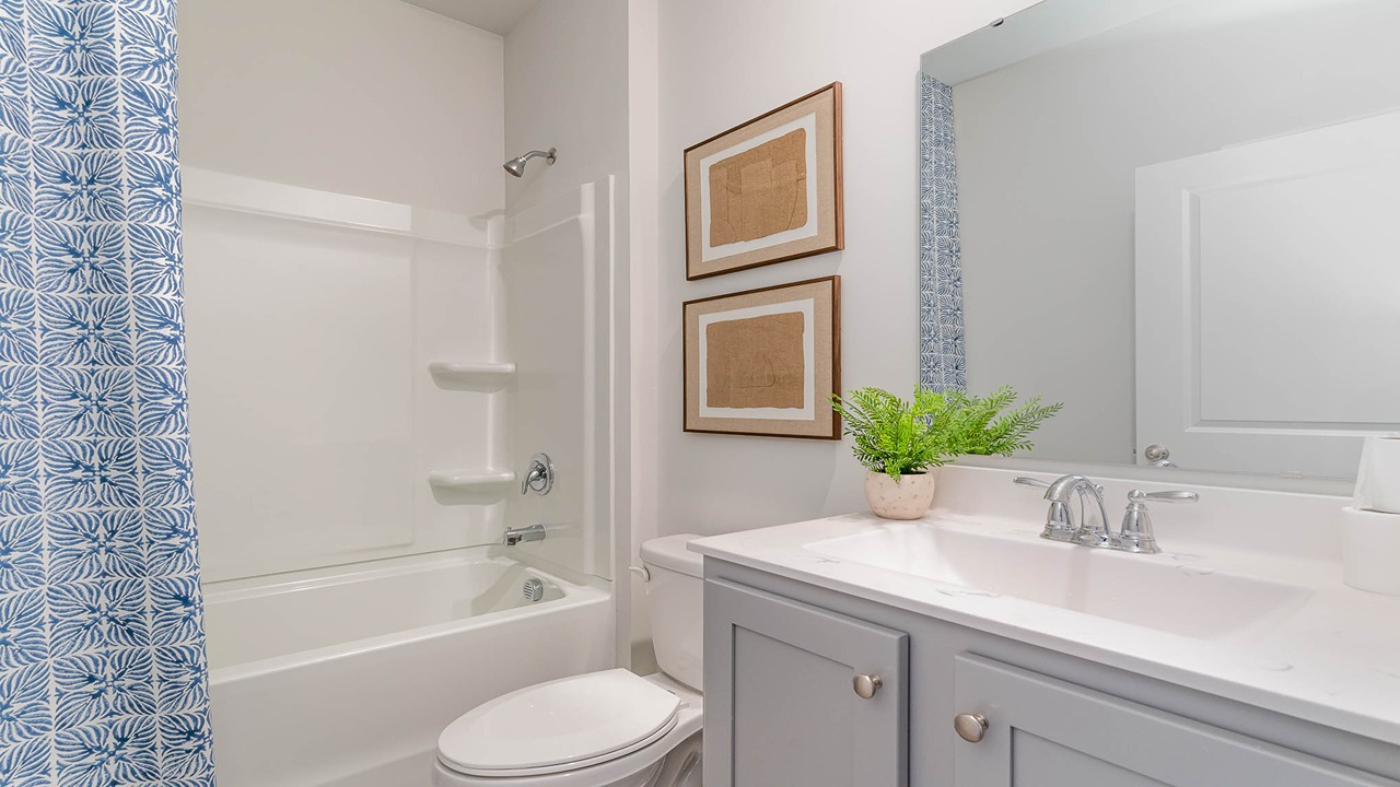 bathroom with quartz counters
