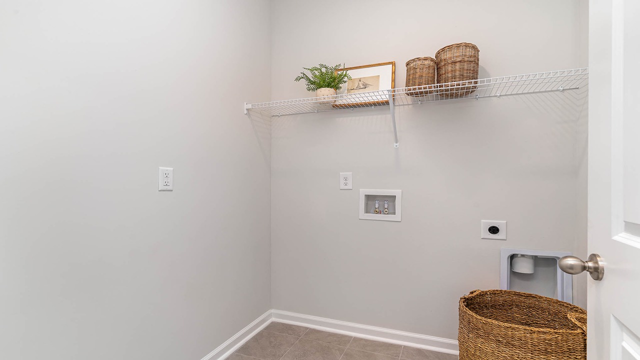 laundry room with wire shelving