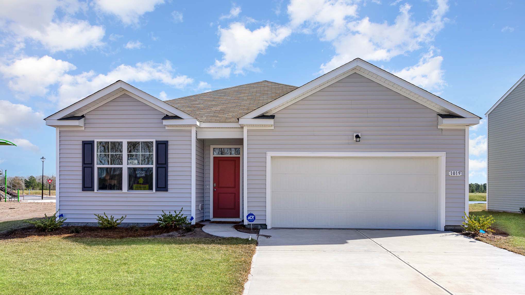 single story home with two car garage