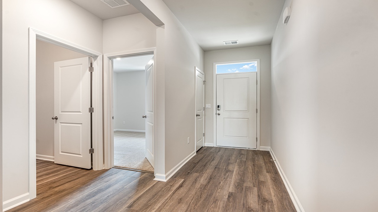 entryway with white door