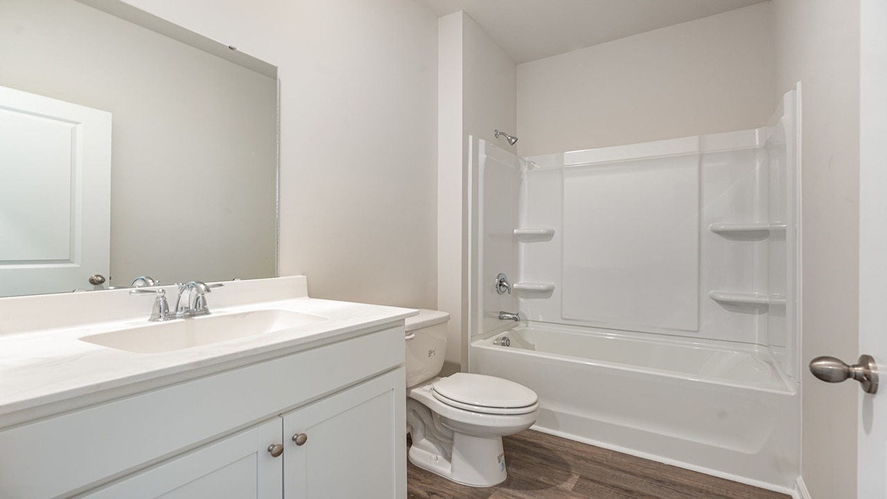 bathroom with quartz counters