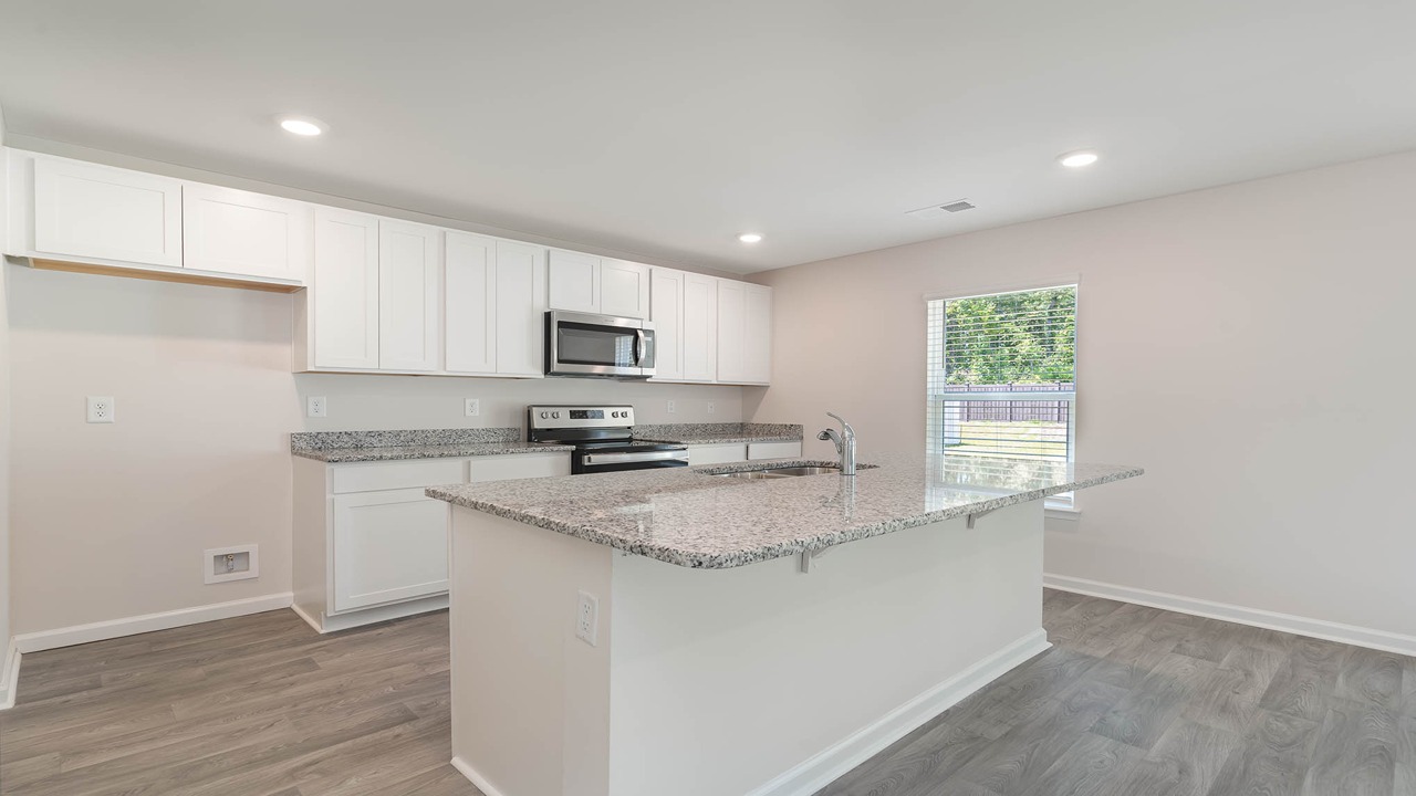 kitchen with white cabinets