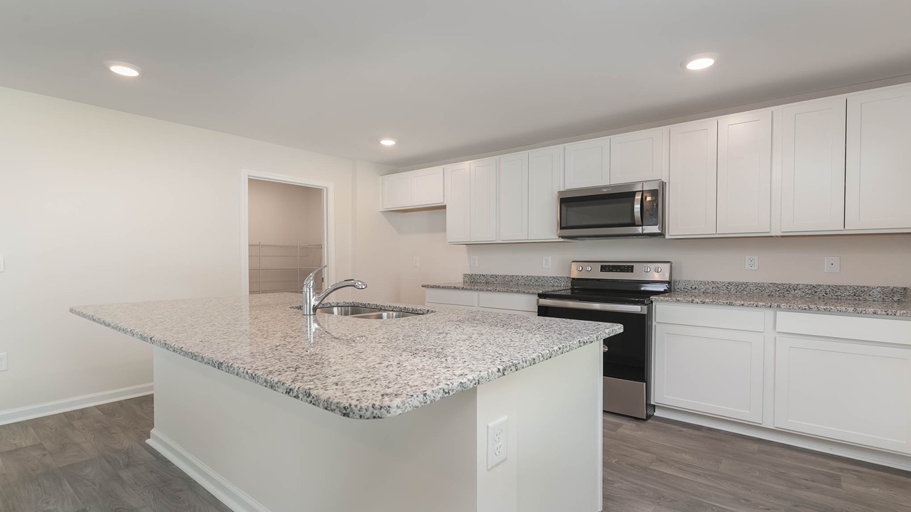 kitchen with white cabinets