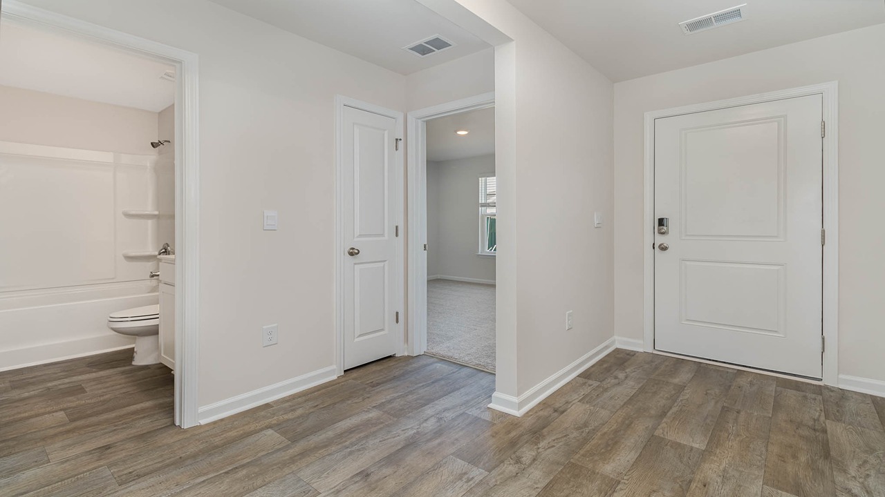 entryway with white door