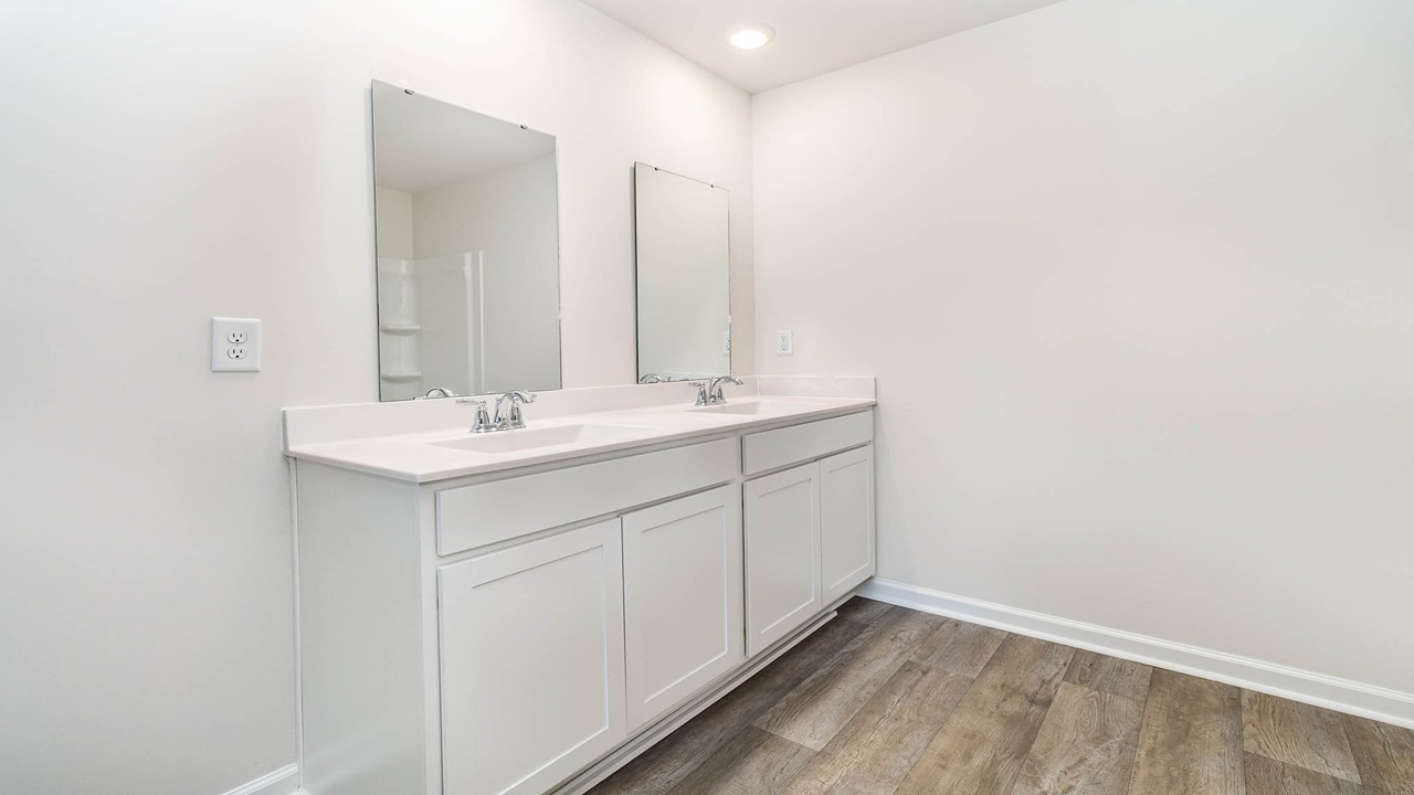 bathroom with quartz counters