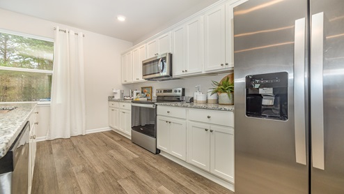 kitchen with white cabinets