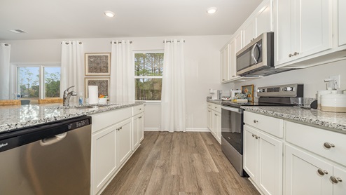 kitchen with white cabinets