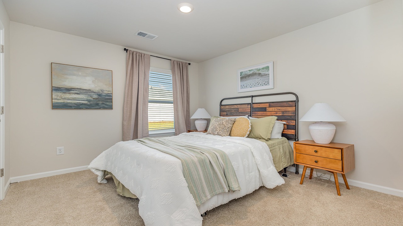 third bedroom with carpet