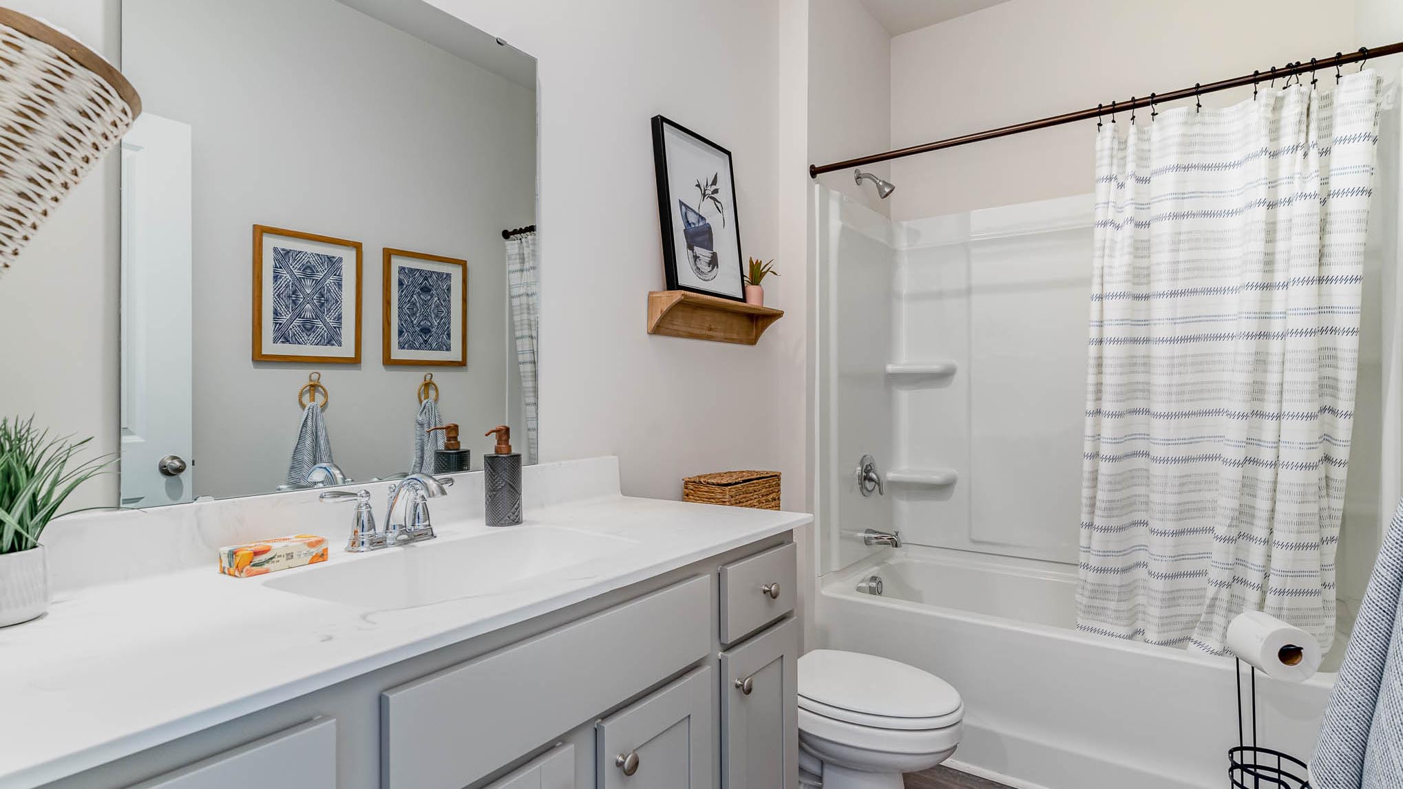 bathroom with quartz counters