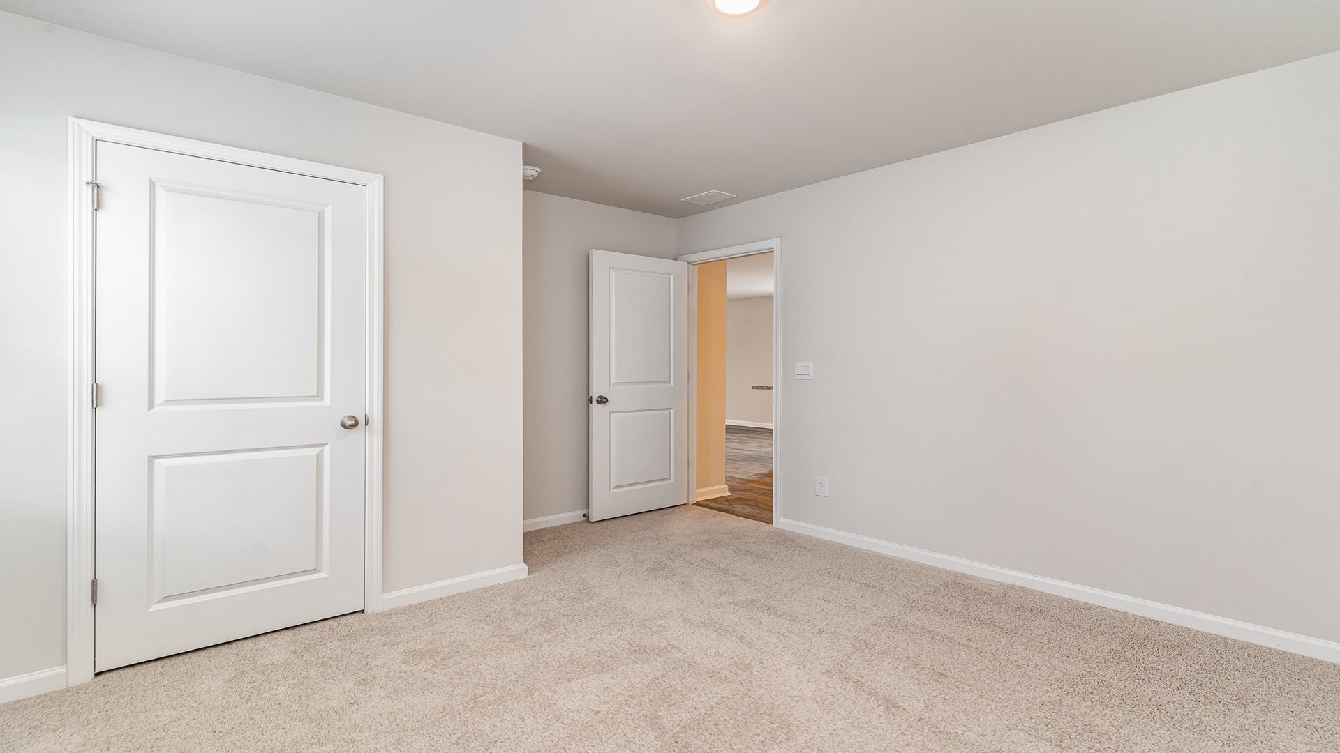 Primary bedroom with window