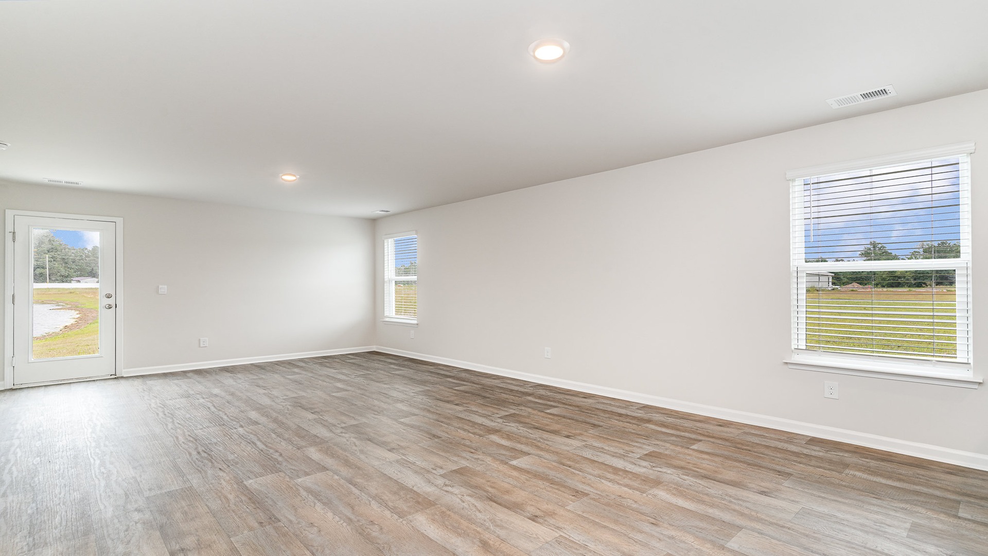 living room with vinyl plank flooring