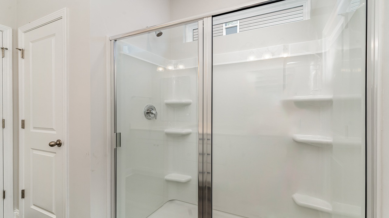 primary bathroom with walk in shower