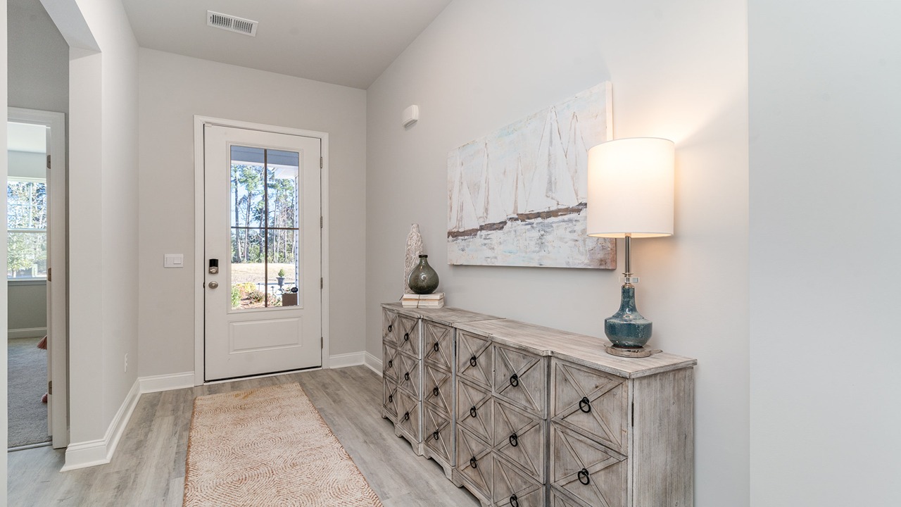 foyer with vinyl plank flooring