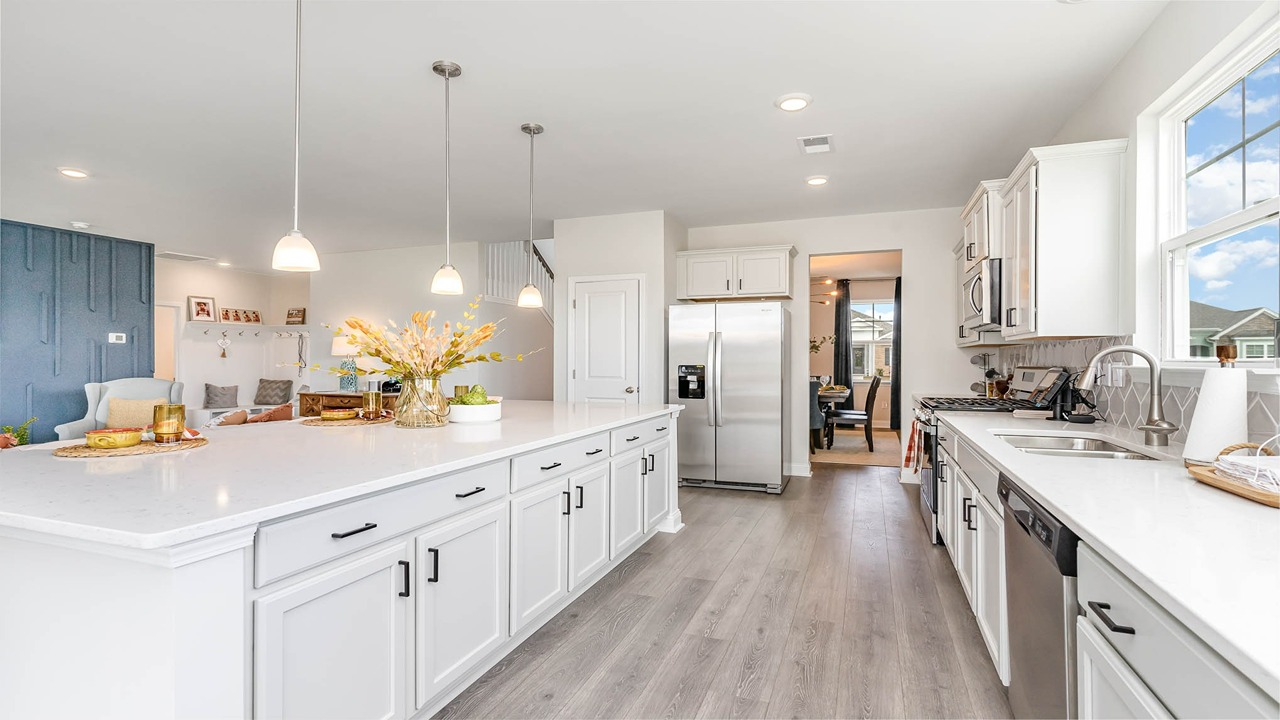 kitchen with gray cabinets and granite countertops
